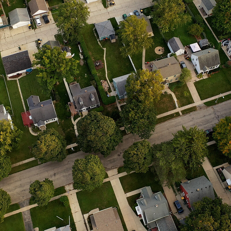 an aerial shot of the como neighborhood homes